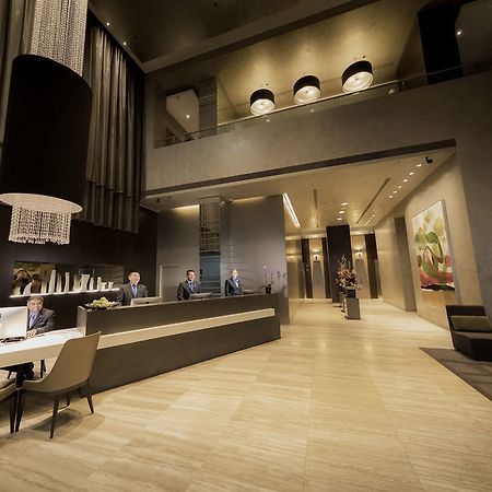 Fraser Suites Sydney Eksteriør billede The lobby of the hotel